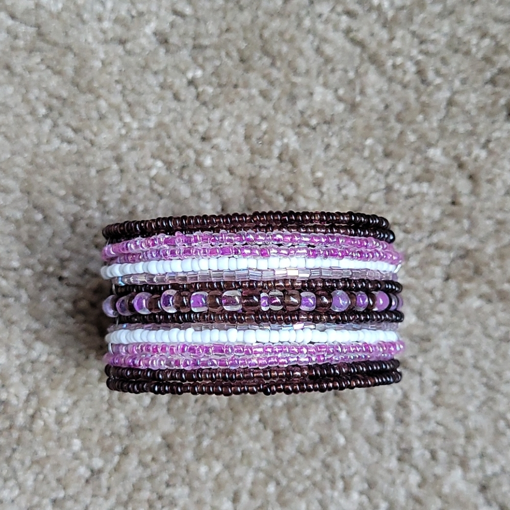 Woman's beaded purple & white bracelet